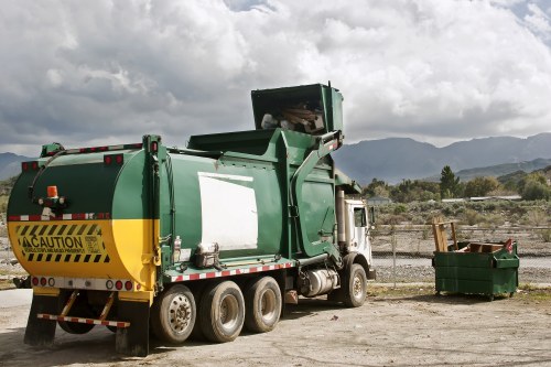 East London waste collection truck in action