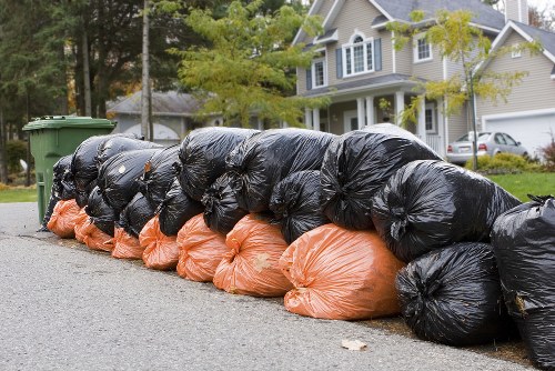 Professionals preparing for garden clearance