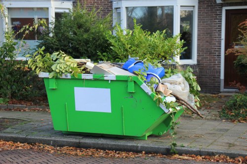 Tools used for efficient garden clearance in Homerton.